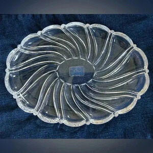 Mikasa Peppermint Swirl 9” Oval Dish NWT.  Tag shows wear from my cleaning it.